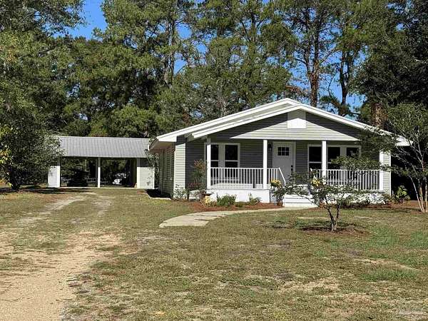 5.35 Acres of Residential Land with Home for Sale in Century, Florida