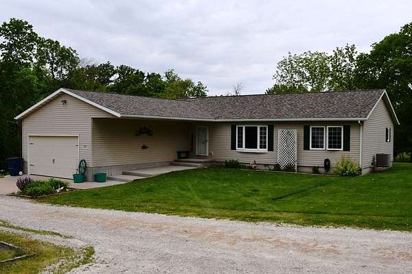 10 Acres of Residential Land with Home for Sale in Carlisle, Iowa