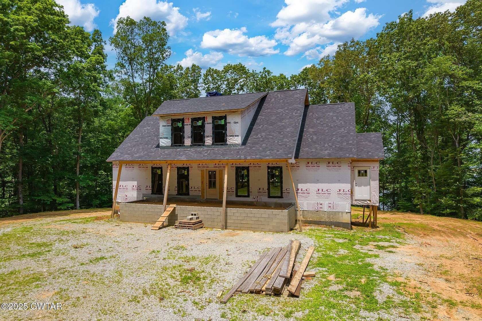 7.2 Acres of Residential Land with Home for Sale in Huntingdon, Tennessee