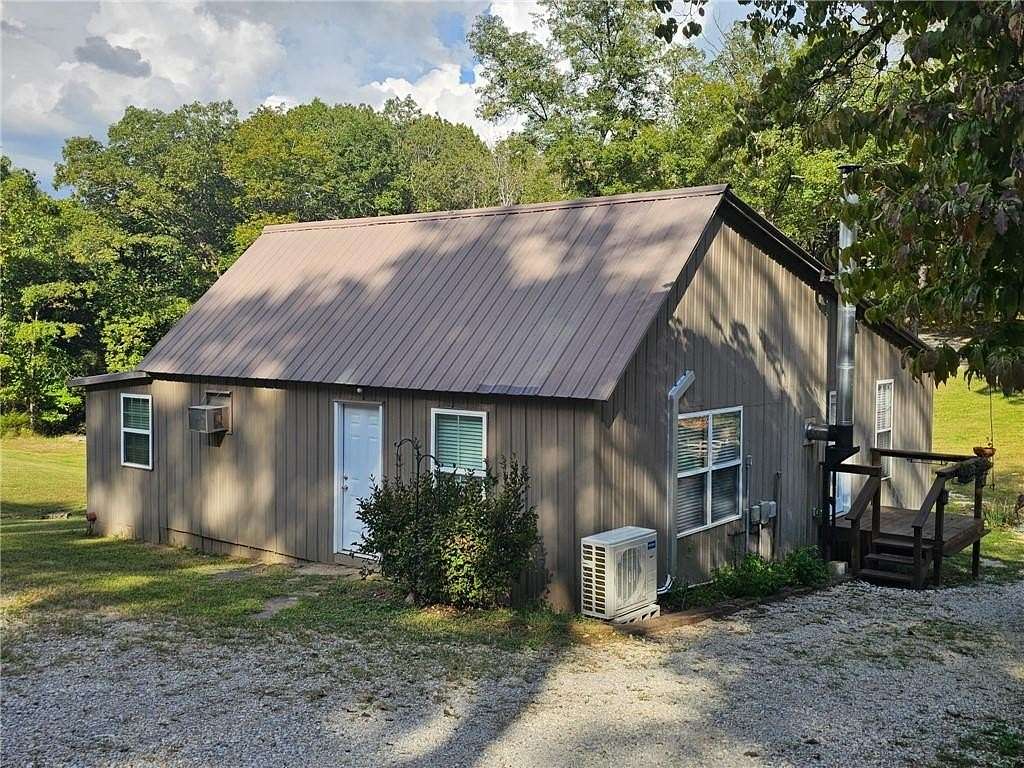 10.5 Acres of Land with Home for Sale in Huntsville, Arkansas