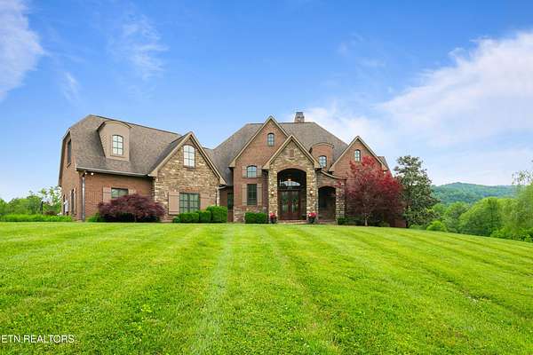 8.6 Acres of Residential Land with Home for Sale in Jellico, Tennessee