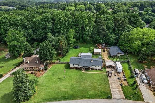 0.88 Acres of Residential Land with Home for Sale in Buford, Georgia