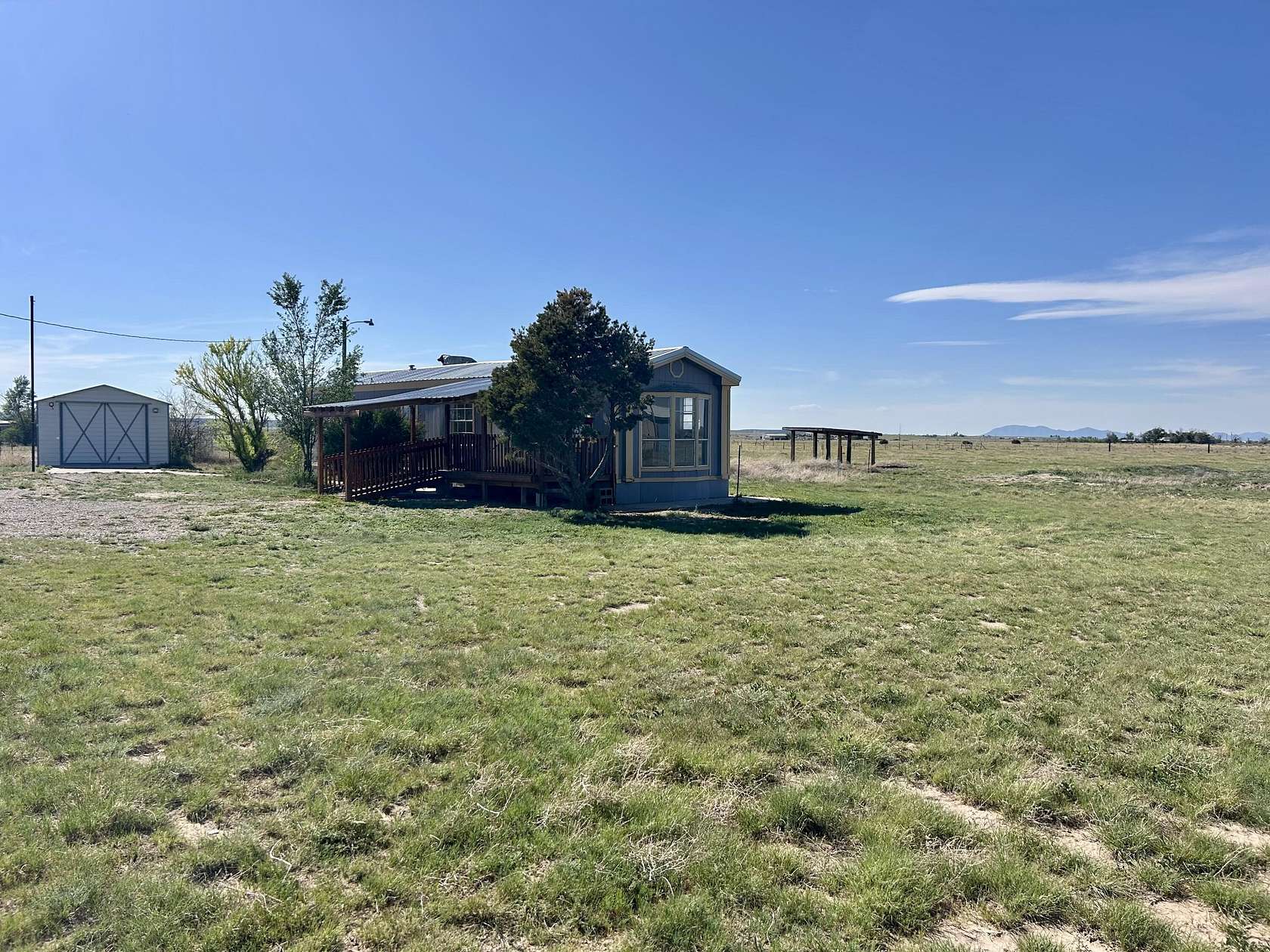 5.3 Acres of Residential Land with Home for Sale in McIntosh, New Mexico