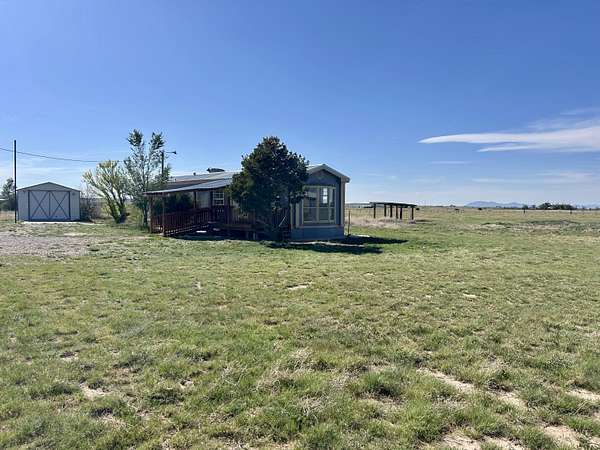 5.3 Acres of Residential Land with Home for Sale in McIntosh, New Mexico