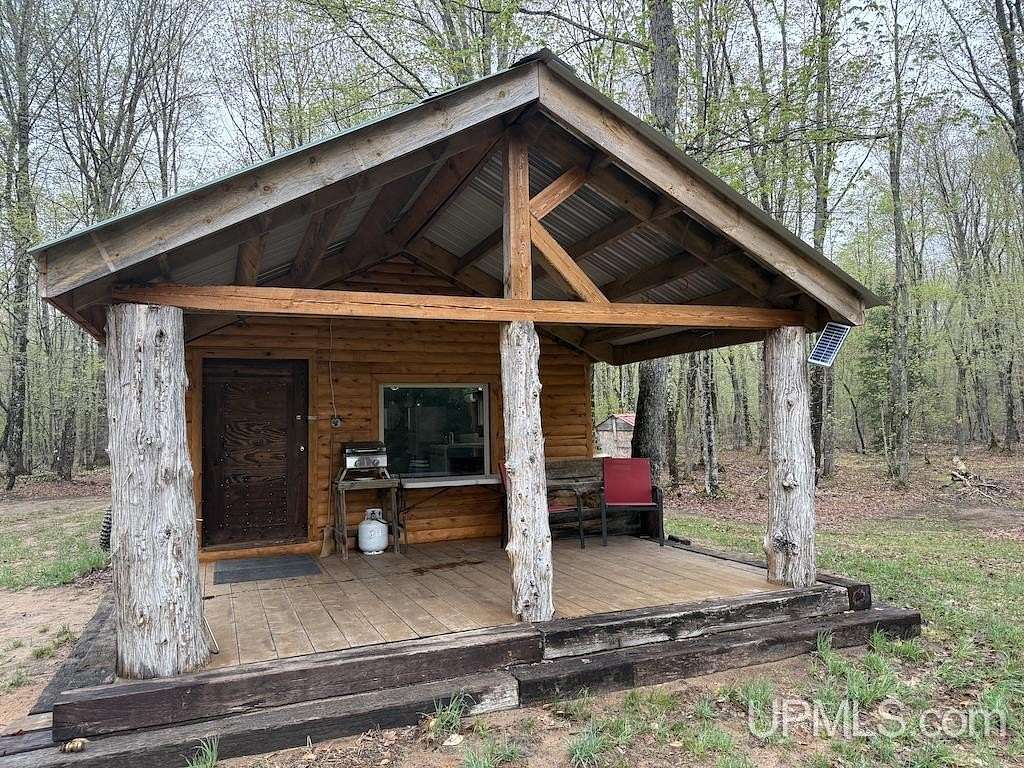 80 Acres of Recreational Land with Home for Sale in Grand Marais, Michigan