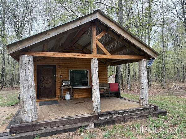 80 Acres of Recreational Land with Home for Sale in Grand Marais, Michigan
