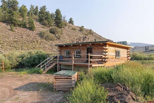36 Acres of Recreational Land with Home for Sale in Gunnison, Colorado