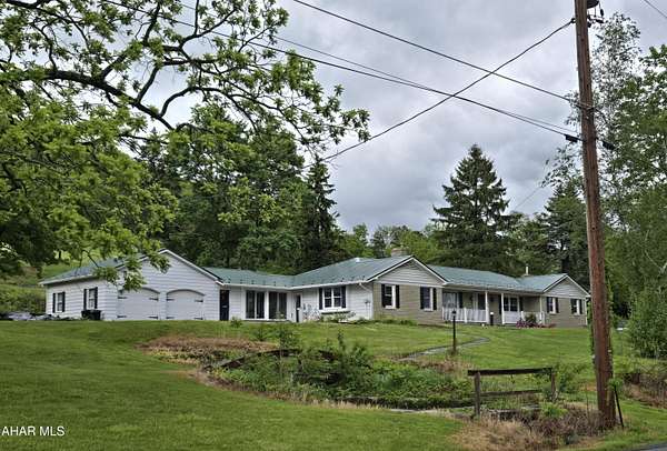 3.9 Acres of Residential Land with Home for Sale in Martinsburg, Pennsylvania