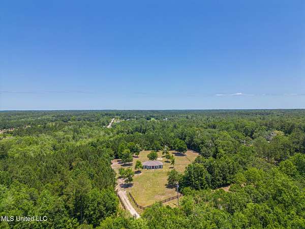 20 Acres of Land with Home for Sale in Gulfport, Mississippi