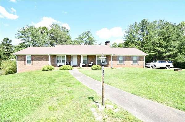 2.73 Acres of Residential Land with Home for Sale in Pilot Mountain, North Carolina