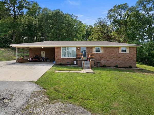 1.58 Acres of Residential Land with Home for Sale in Tuscumbia, Alabama