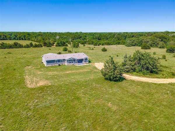 18 Acres of Land with Home for Sale in Cumby, Texas