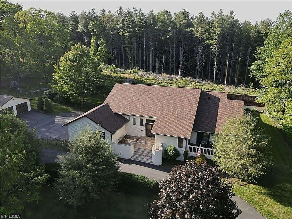 2.49 Acres of Residential Land with Home for Sale in Glade Valley, North Carolina