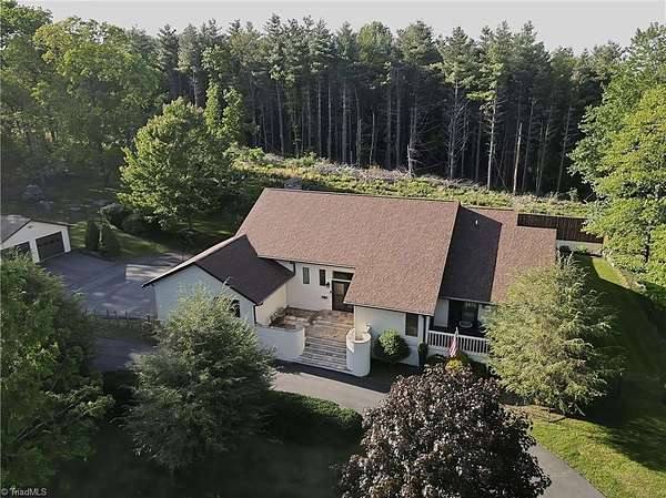 2.49 Acres of Land with Home for Sale in Glade Valley, North Carolina