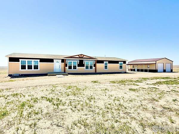 40 Acres of Land with Home for Sale in Briggsdale, Colorado