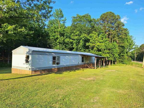 2.5 Acres of Residential Land with Home for Sale in Lockesburg, Arkansas