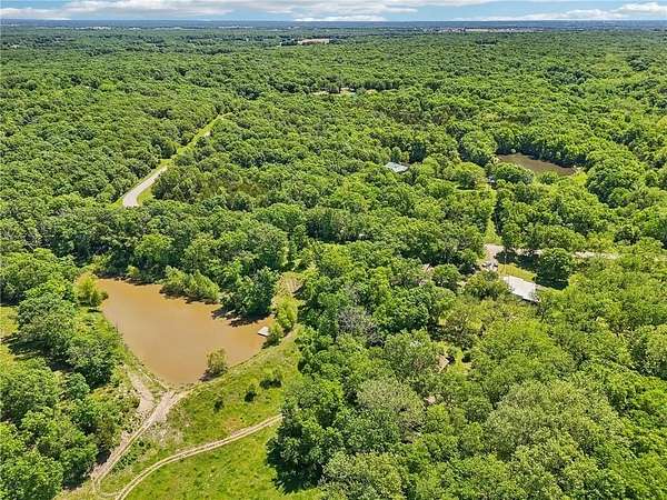 53 Acres of Land with Home for Sale in Leeton, Missouri