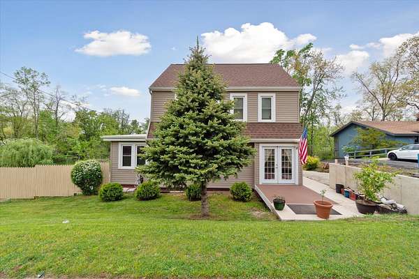 5 Acres of Residential Land with Home for Sale in Portage, Michigan