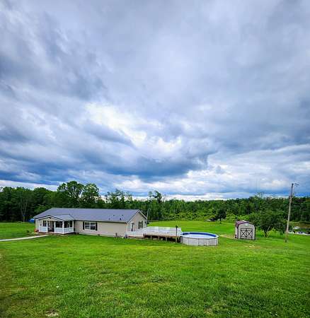 11.3 Acres of Land with Home for Sale in Frenchburg, Kentucky