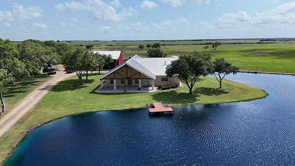 57.8 Acres of Recreational Land with Home for Sale in Blessing, Texas