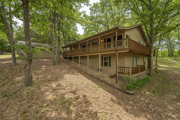 5.1 Acres of Residential Land with Home for Sale in Rogersville, Missouri