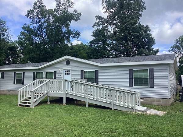 3.49 Acres of Land with Home for Sale in Garfield, Arkansas