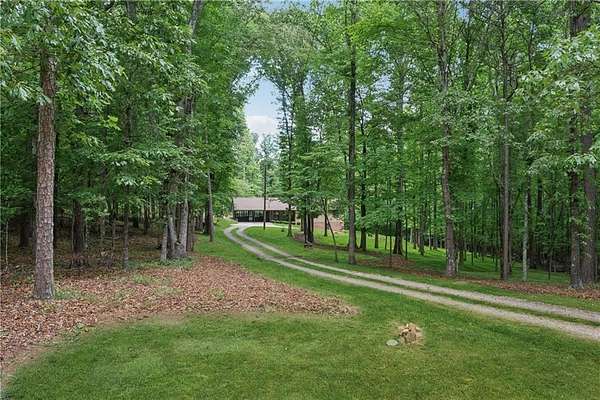 7.27 Acres of Land with Home for Sale in Alpharetta, Georgia