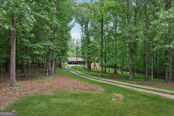 7.27 Acres of Land with Home for Sale in Alpharetta, Georgia