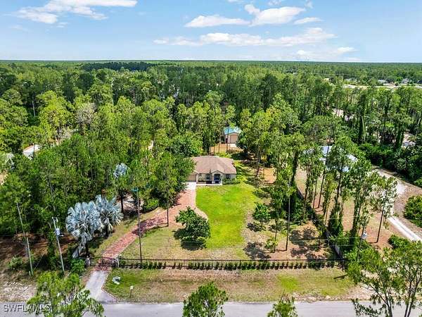 2.73 Acres of Residential Land with Home for Sale in Naples, Florida
