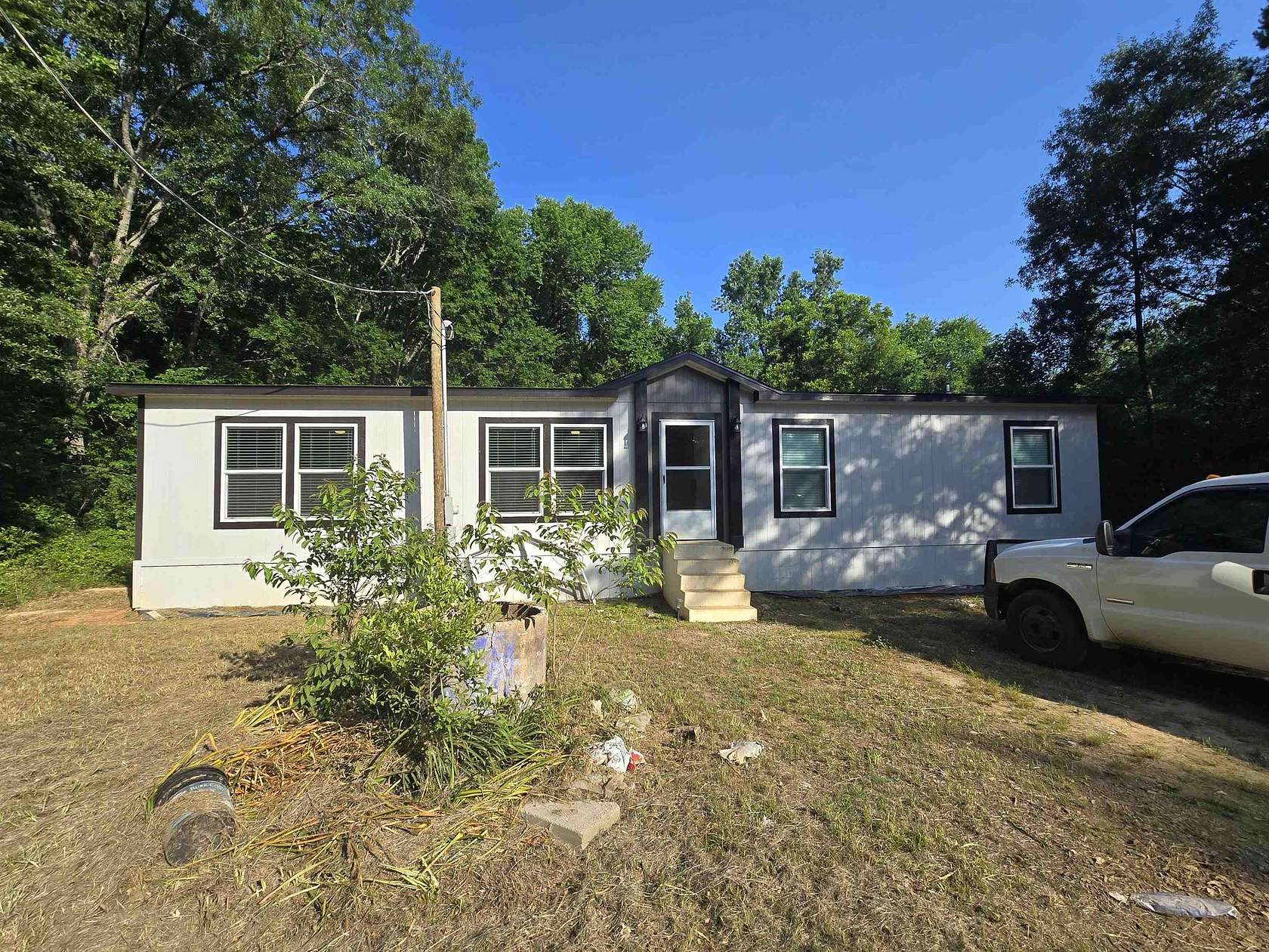 5.68 Acres of Residential Land with Home for Sale in Beckville, Texas