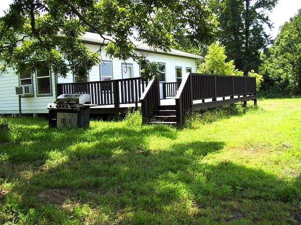 80 Acres of Recreational Land with Home for Sale in Ashdown, Arkansas