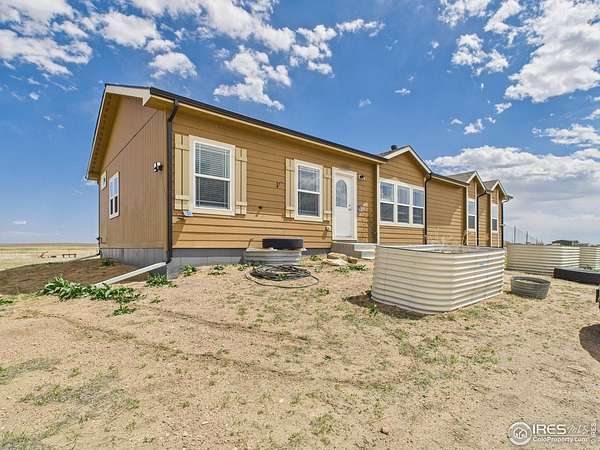 40 Acres of Agricultural Land with Home for Sale in Briggsdale, Colorado