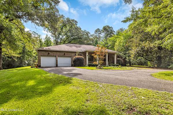 11.7 Acres of Land with Home for Sale in Saucier, Mississippi