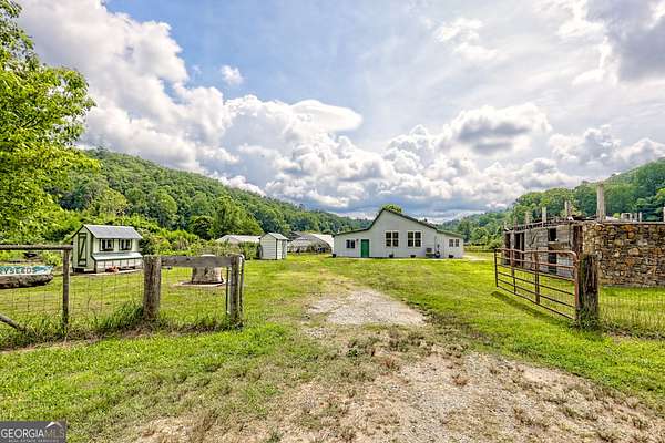 23.1 Acres of Land with Home for Sale in Clayton, Georgia