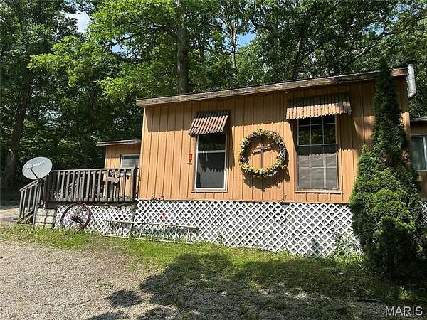 5 Acres of Residential Land with Home for Sale in Monroe City, Missouri