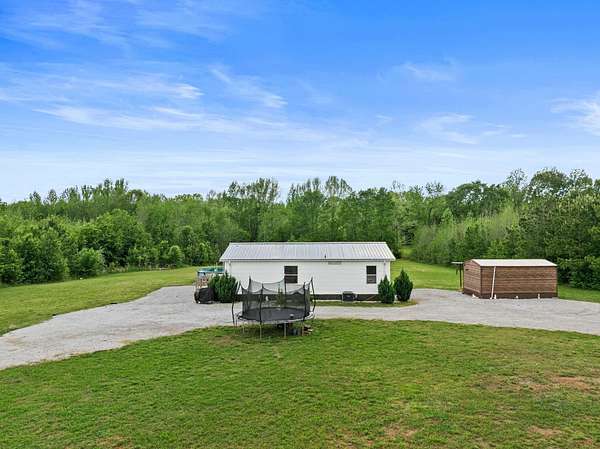 10.2 Acres of Land with Home for Sale in Florence, Alabama