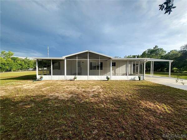 1.89 Acres of Residential Land with Home for Sale in Homosassa, Florida