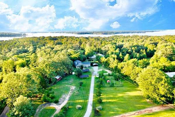 15.4 Acres of Land with Home for Sale in Leesburg, Texas