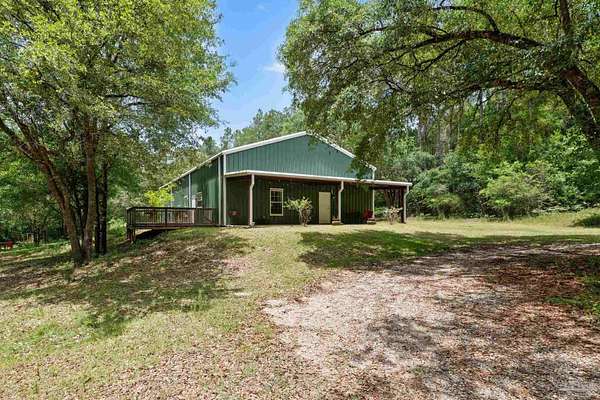 18 Acres of Land with Home for Sale in Pace, Florida