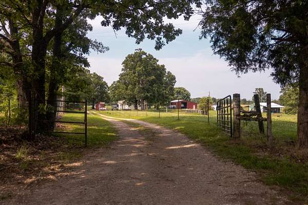 80 Acres of Land with Home for Sale in Thayer, Missouri