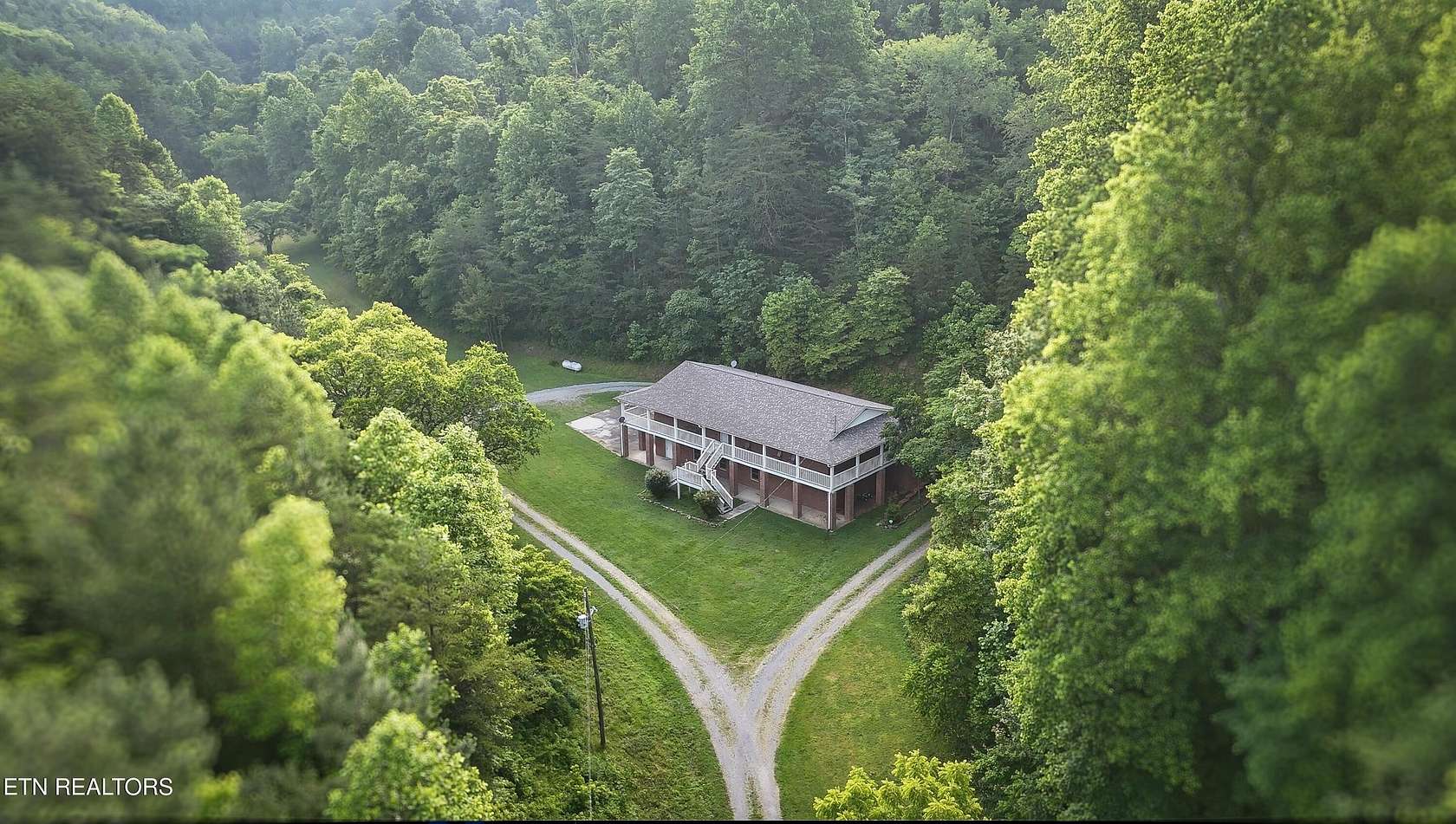 97.5 Acres of Land with Home for Sale in Sevierville, Tennessee