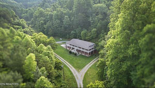 97.5 Acres of Land with Home for Sale in Sevierville, Tennessee