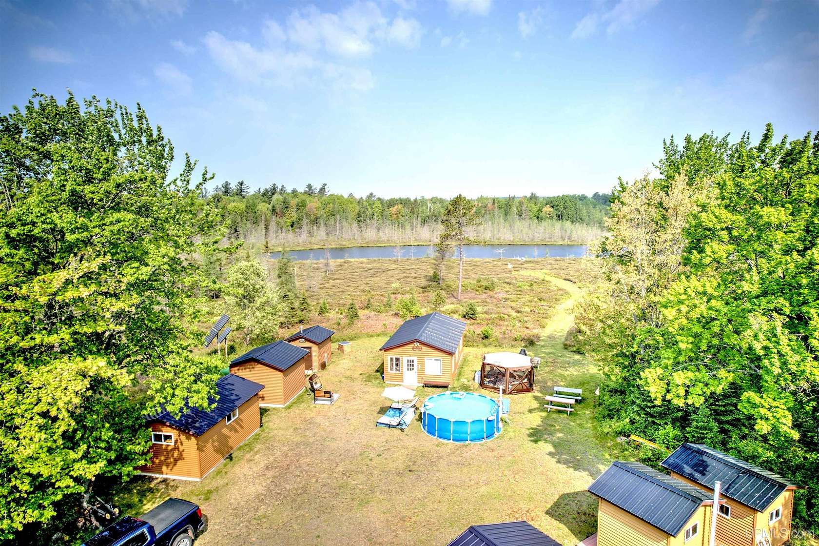 80 Acres of Recreational Land with Home for Sale in Republic, Michigan