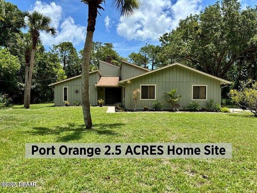 2.54 Acres of Residential Land with Home for Sale in Port Orange, Florida