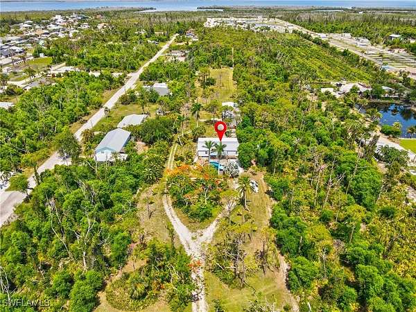 5.46 Acres of Residential Land with Home for Sale in St. James City, Florida