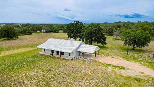 10 Acres of Residential Land with Home for Sale in Sutherland Springs, Texas