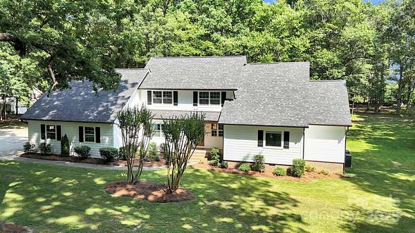 2.35 Acres of Residential Land with Home for Sale in Matthews, North Carolina