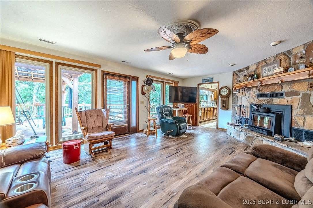 5.5 Acres of Residential Land with Home for Sale in Linn Creek, Missouri