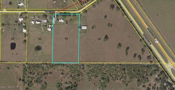 5 Acres of Residential Land with Home for Sale in Moore Haven, Florida
