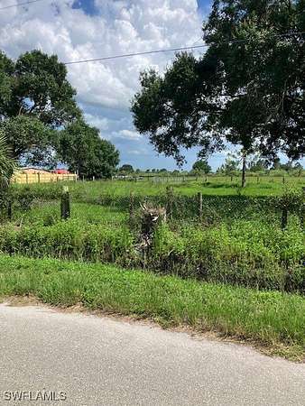 5 Acres of Residential Land with Home for Sale in Moore Haven, Florida